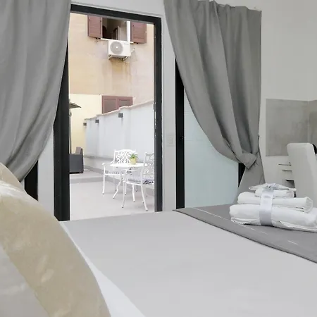 Casa de hóspedes Roman Holiday Suites *